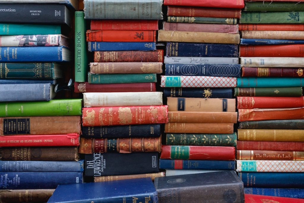 Photo of colourful stack of historic books